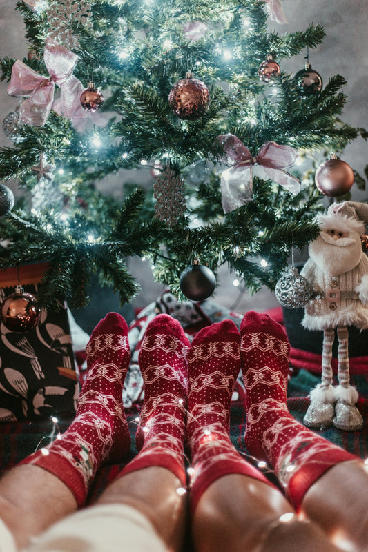 two people wearing red-and-white socks