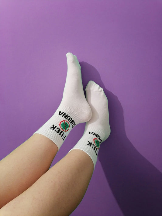 person wearing white and gray socks