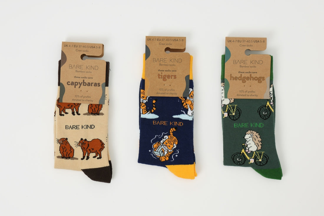 Three pairs of socks with animals on them
