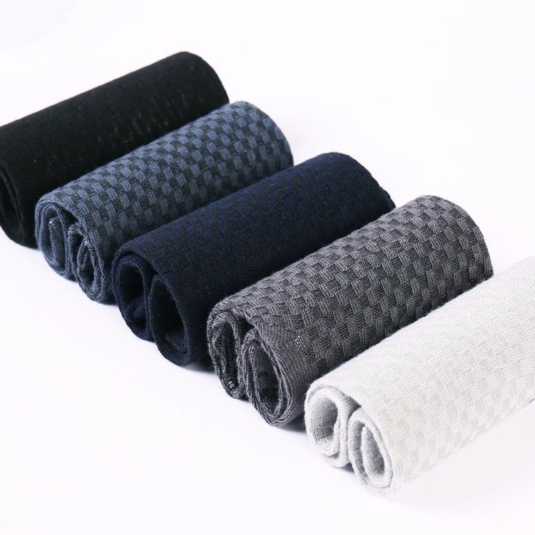 Set of six rolled cotton dish towels in black, dark blue, navy, dark gray, light gray, featuring a textured weave.
