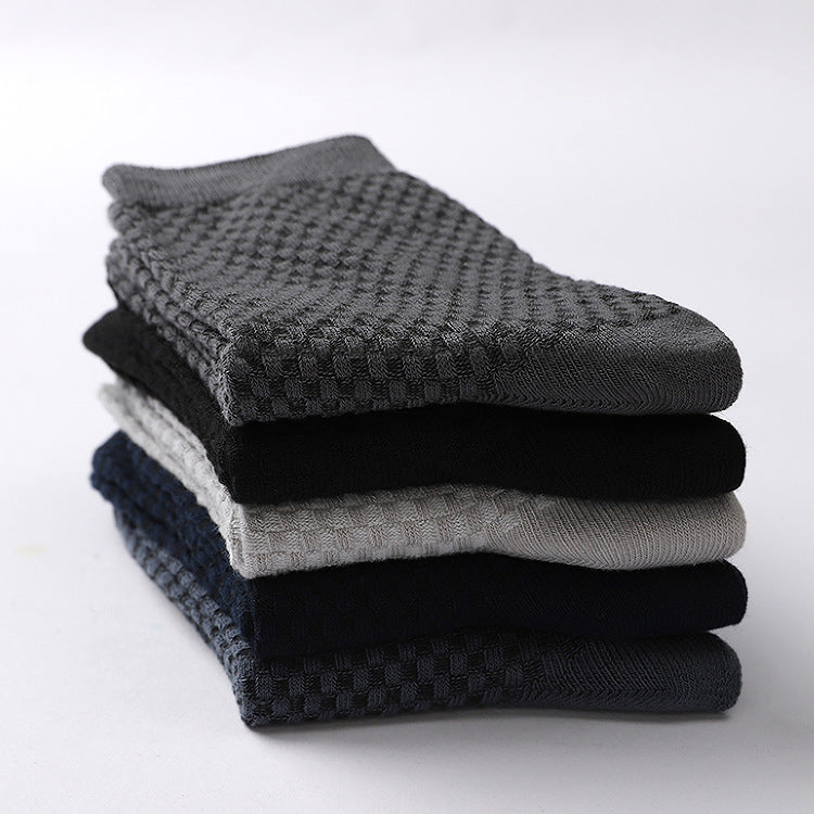 Set of 6 textured socks in black, gray, and navy colors, made from soft, breathable material.