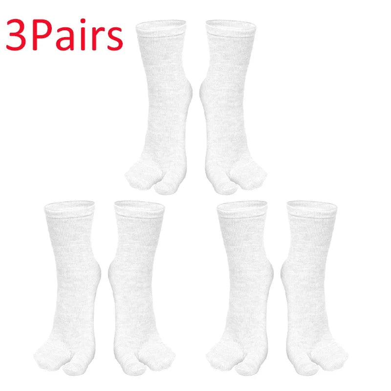 Three pairs of soft white cotton socks, comfortable fit for everyday wear.