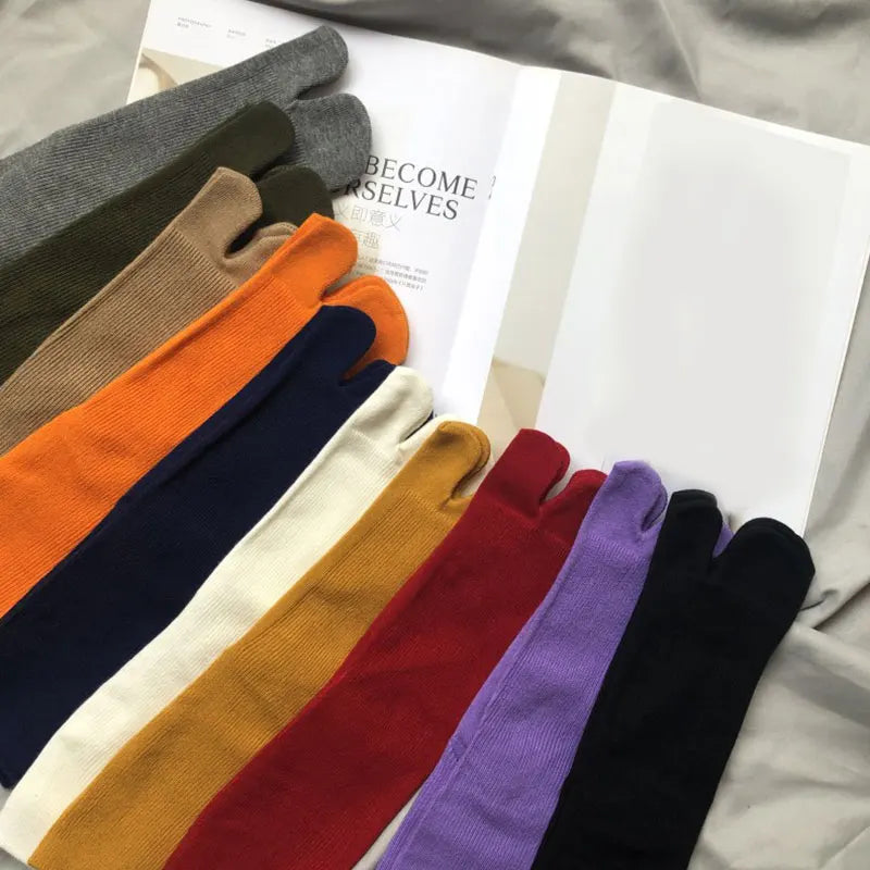 Colorful toe socks in various shades, made from soft cotton material, perfect for casual wear.