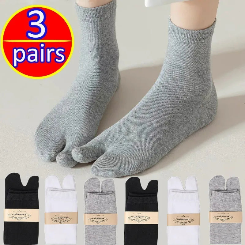 3 pairs of comfortable toe socks in gray, black, and white, perfect for everyday wear.