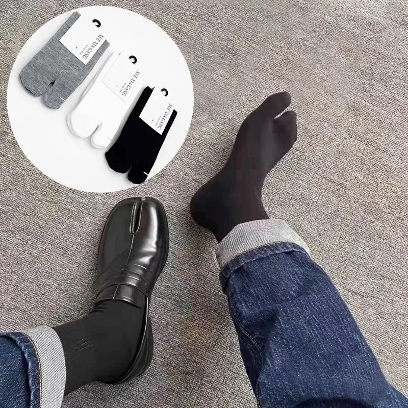 Men's black toe socks paired with dress shoes, showcased with grey, white, and black color options.