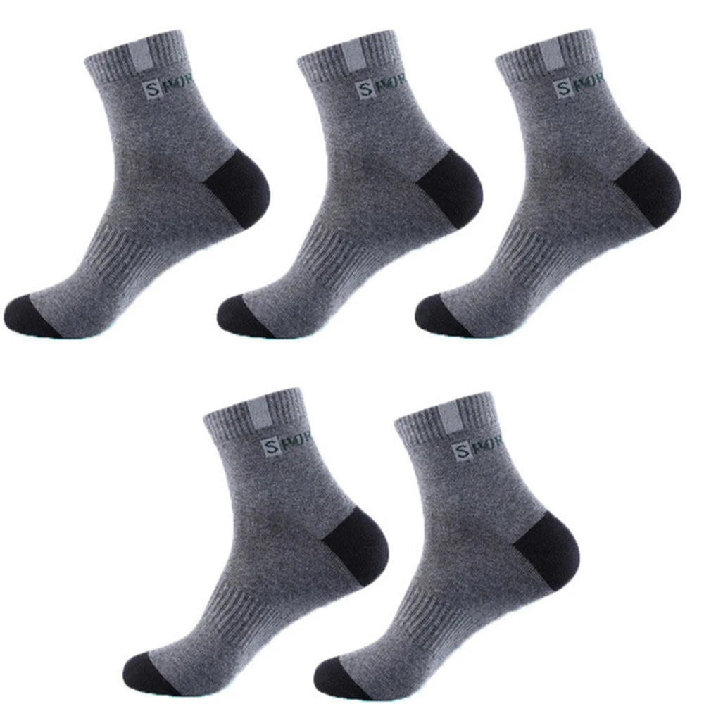 Set of 5 pairs of grey ankle socks with black detailing, made from soft, breathable material for comfort.