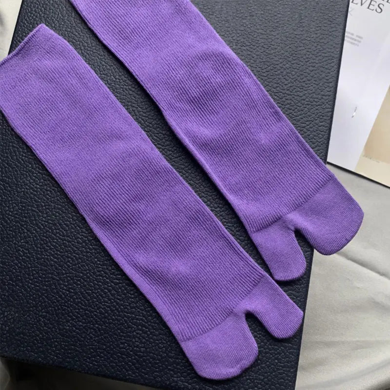 Purple toe socks made of soft cotton for comfort and style, perfect for layering or casual wear.