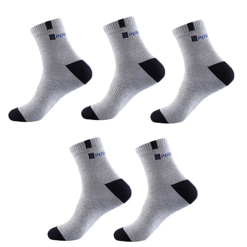 Men's athletic socks in gray and black, made for comfort and durability, pack of four pairs.