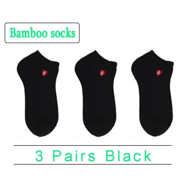 3 pairs of black bamboo socks, soft and breathable for ultimate comfort and style.